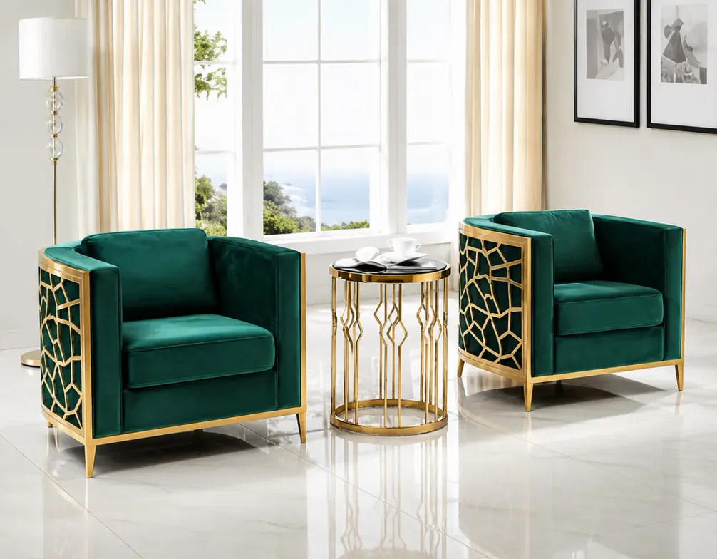 Two green armchairs and a side table on gold PVD-coated metal frames in a bright interior
