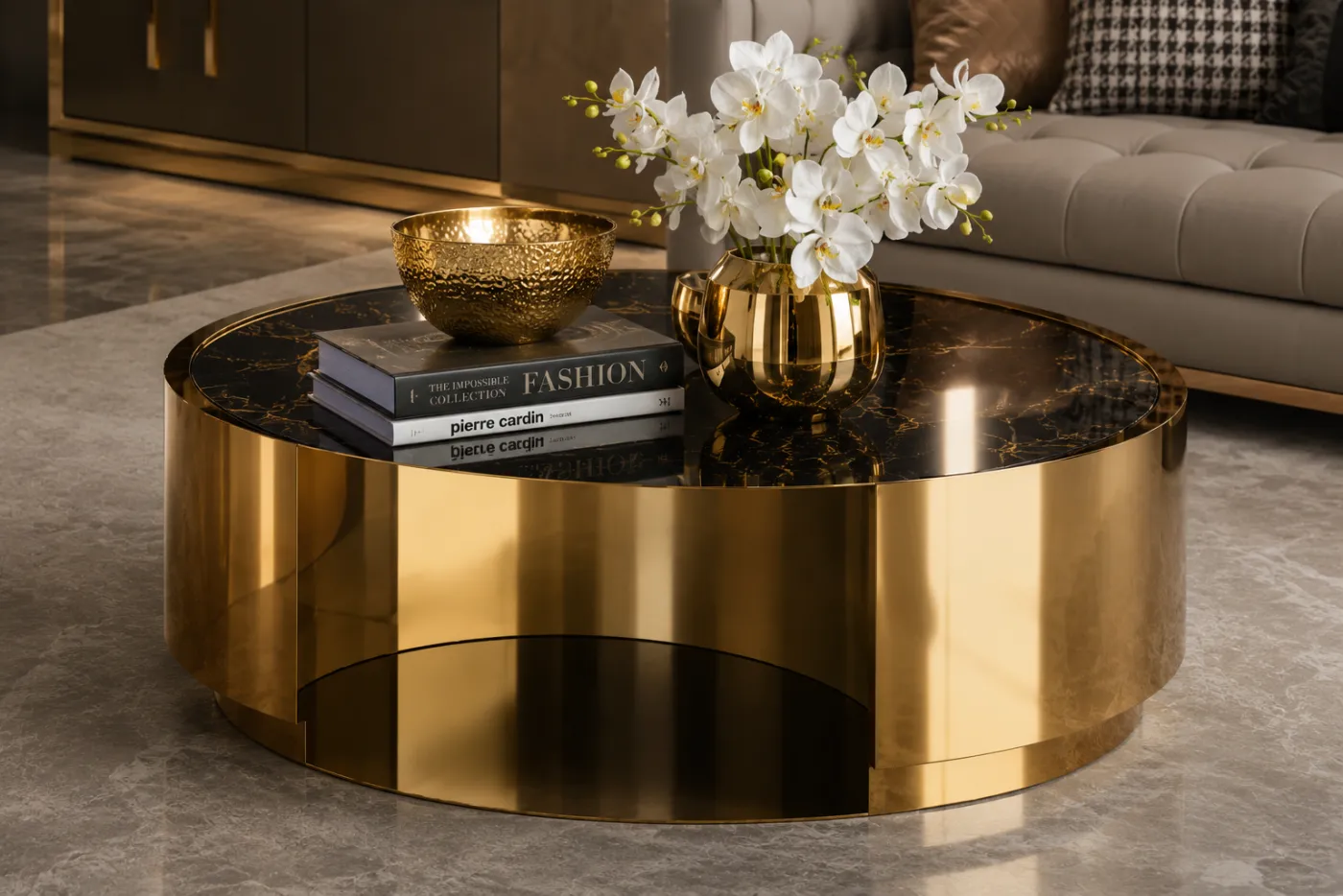 Centre table, chair and console metal frames in a champagne-gold PVD finish