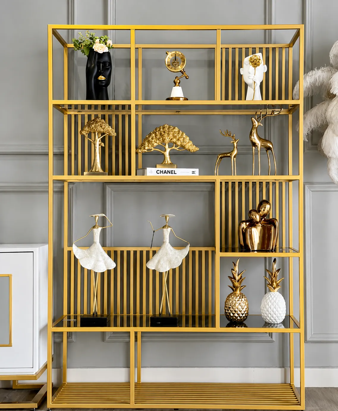 Interior partition grill in a gold PVD finish