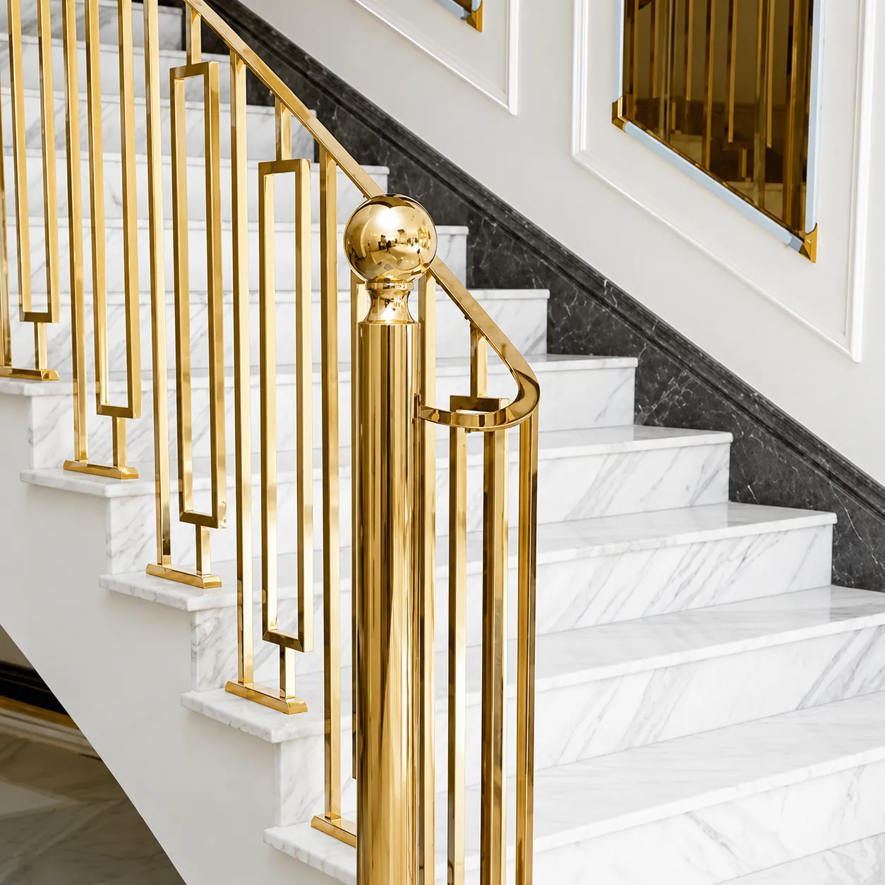 Staircase railing in a gold PVD finish