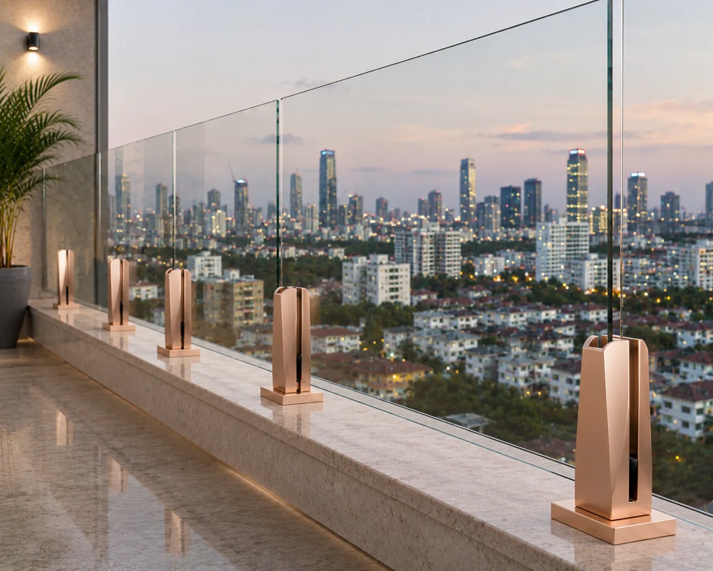 Glass railing spigot in a rose-gold PVD finish